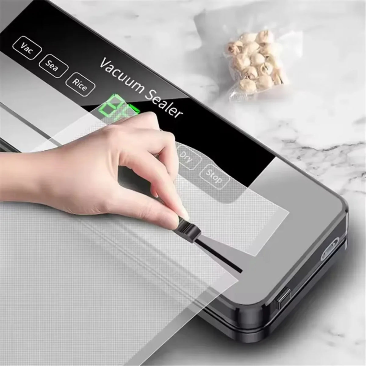 Machine sous vide électrique avec cutter intégré